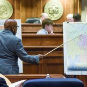 Sen. Rodger Smitherman compares U.S. Representative district maps during the special session on redistricting at the Alabama Statehouse in Montgomery, Ala., Nov. 3, 2021. The U.S. Supreme Court ruled Thursday, June 8, 2023, that Alabama’s U.S. House districts violated the federal Voting Rights Act by diluting the political power of Black voters.(Mickey Welsh/The Montgomery Advertiser via AP, File)