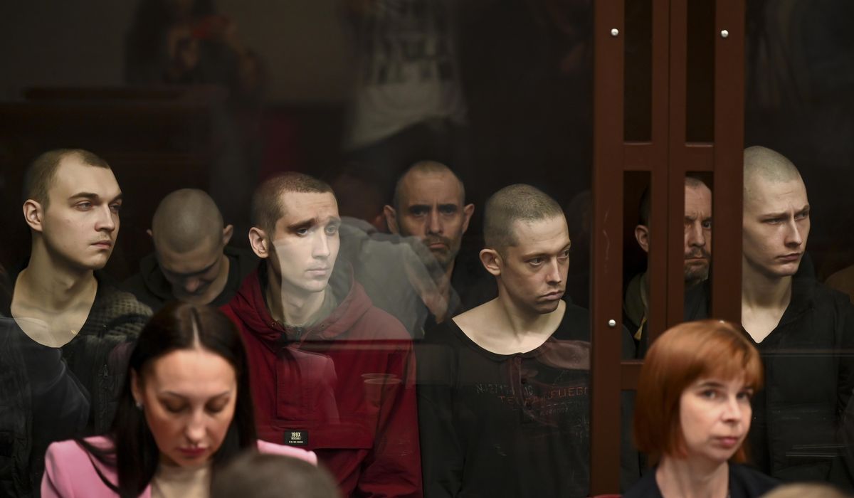 NextImg:Captured Ukrainian soldiers face trial in Russia