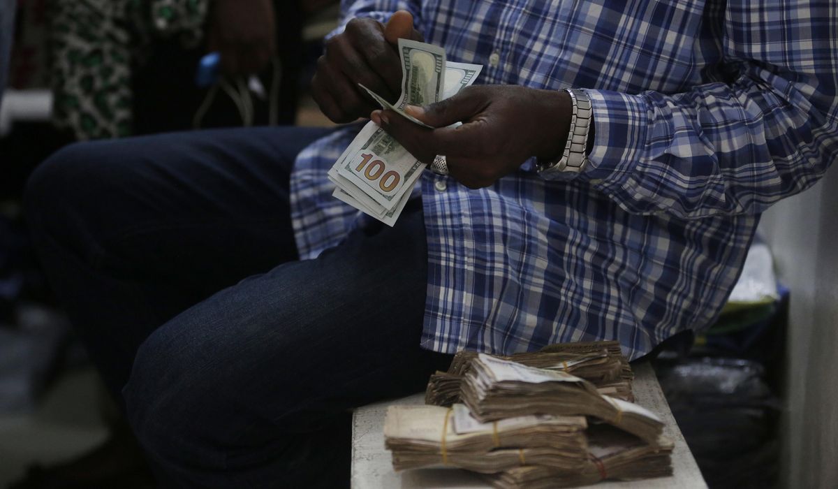 NextImg:Nigeria lets market set currency exchange rate to stabilize economy, woo investors