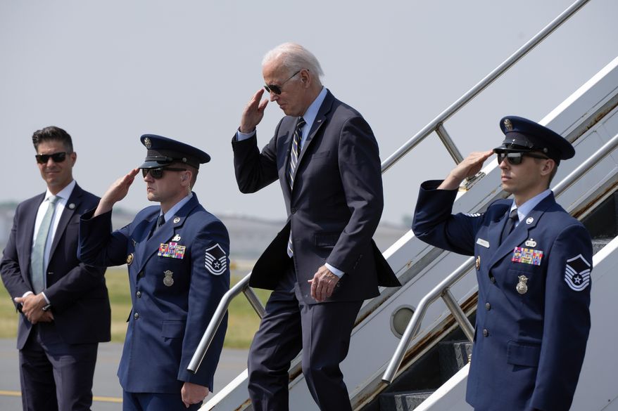 President Joe Biden returns a salute as he walks down the steps of Air Force One at Philadelphia International Airport in Philadelphia, Saturday, June 17, 2023. (AP Photo/Manuel Balce Ceneta)