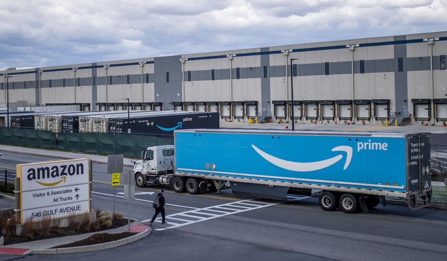 A truck arrives at the Amazon warehouse facility in the Staten Island borough of New York on April 1, 2022. (AP Photo/Eduardo Munoz Alvarez) **FILE**
