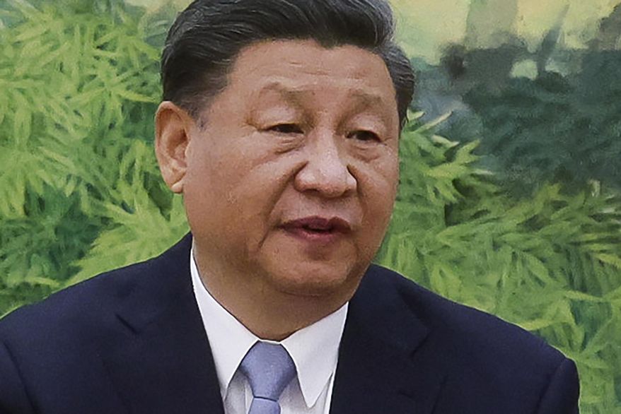 Chinese President Xi Jinping gestures as he meets with U.S. Secretary of State Antony Blinken in the Great Hall of the People in Beijing, China, Monday, June 19, 2023. (Leah Millis/Pool Photo via AP)