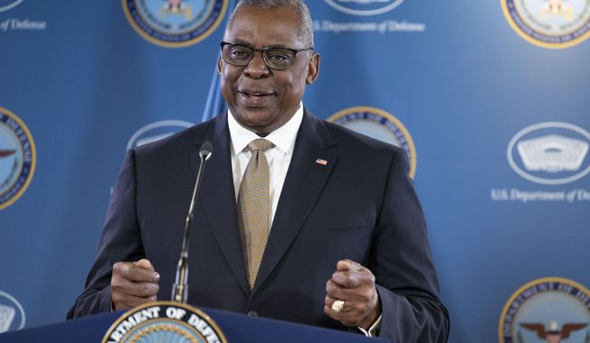 Defense Secretary Lloyd Austin holds a press briefing with Chairman of the Joint Chiefs of Staff Gen. Mark Milley at the Pentagon on Thursday, May 25, 2023, in Washington. (AP Photo/Kevin Wolf)