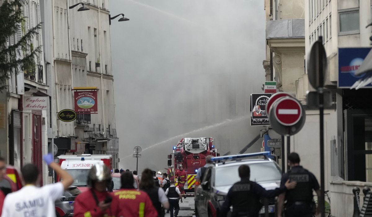 NextImg:Explosion hits a building in Paris, injuring four people. Police are trying to determine the cause