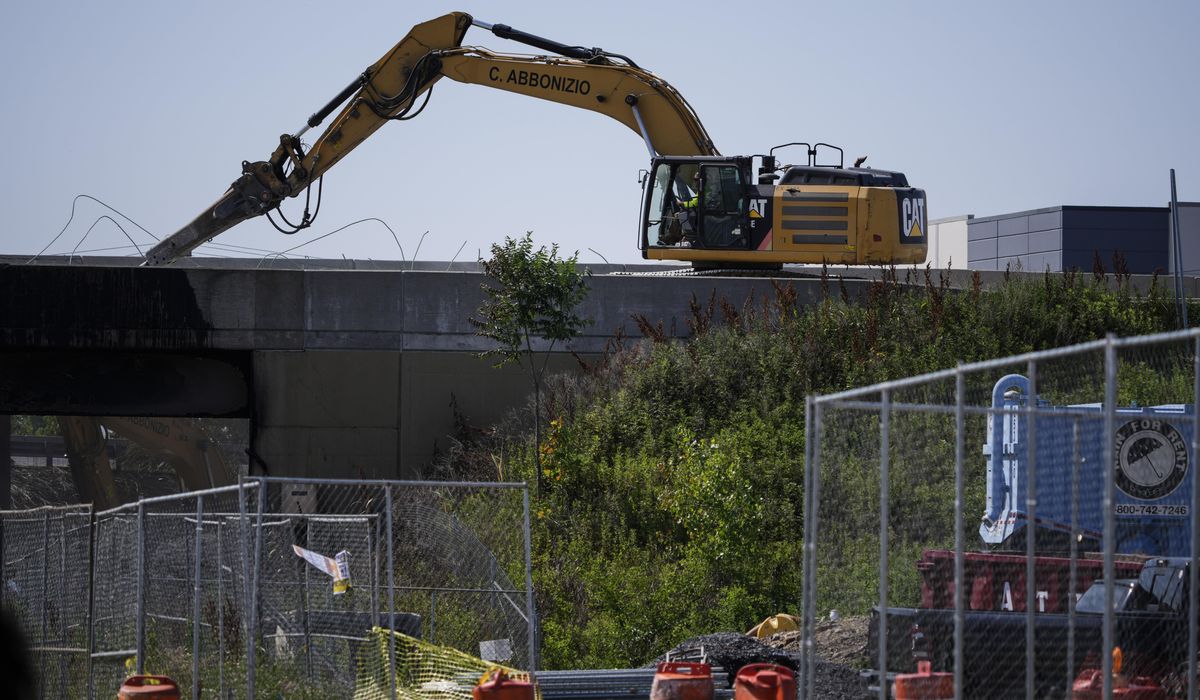 NextImg:In the effort to reopen I-95 in Philadelphia, crews get some help from a NASCAR fan