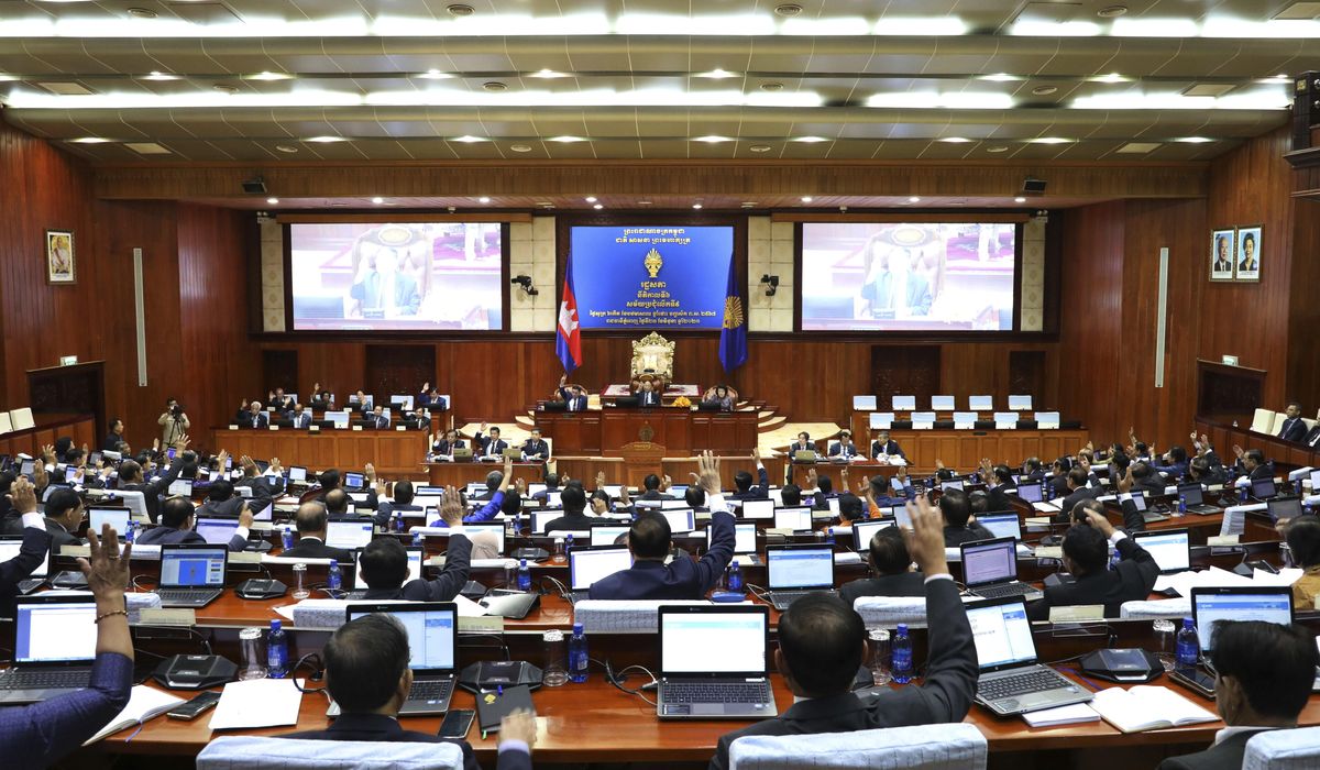 NextImg:Cambodian lawmakers approve changes to election law that disqualify candidates who don’t vote