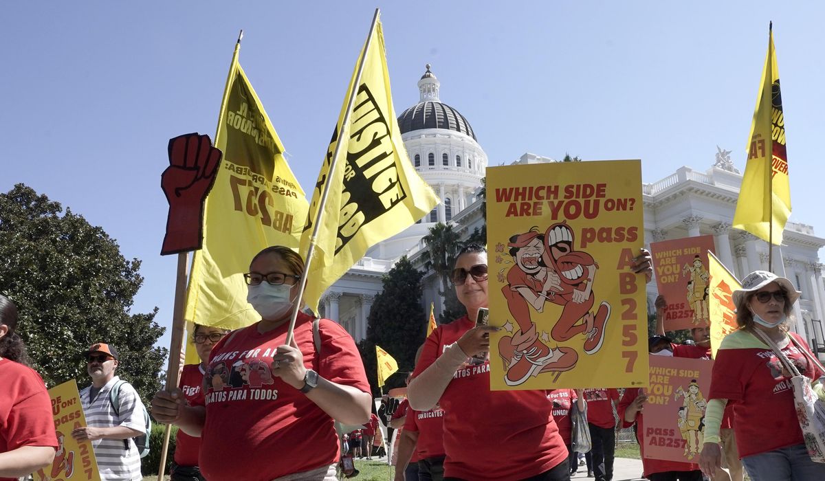 NextImg:California’s law aimed at fast-food wages is on hold. Lawmakers may have found a way around it