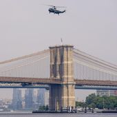 Marine One with President Joe Biden abroad flies over the Brooklyn Bridge as it arrives in New York, Thursday, June 29, 2023. (AP Photo/Andrew Harnik)