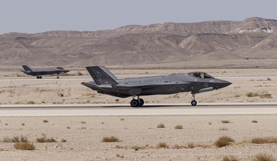 An Israeli F-35 lands at Ovda airbase during the bi-annual multinational aerial exercise known as the Blue Flag, at Ovda airbase near Eilat, southern Israel, Sunday, Oct. 24, 2021. (AP Photo/Tsafrir Abayov, File)
