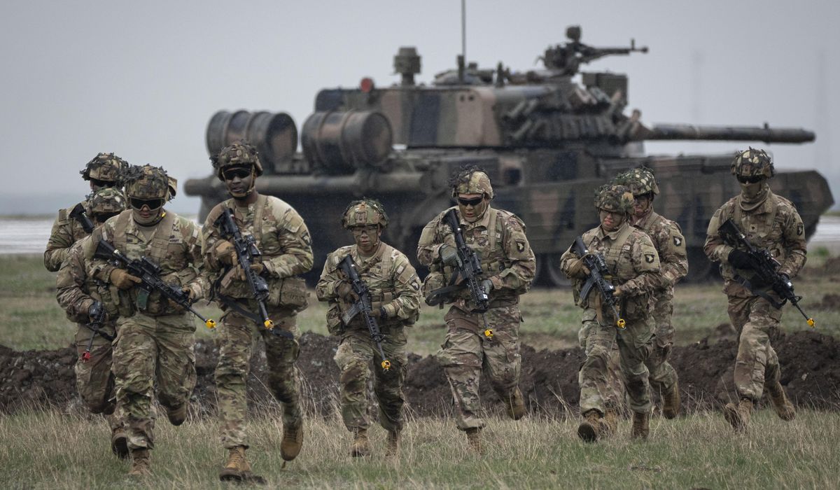 NextImg:NATO readies military plans to defend against bruised but unbowed Russia