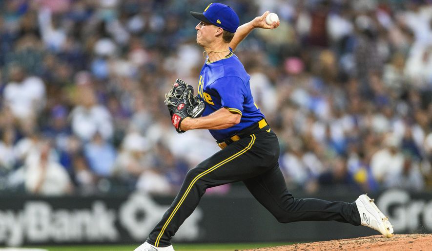Seattle Mariners relief pitcher Trevor Gott throws to a Tampa Bay Rays batter during the fifth inning of a baseball game Friday, June 30, 2023, in Seattle. (AP Photo/Caean Couto)