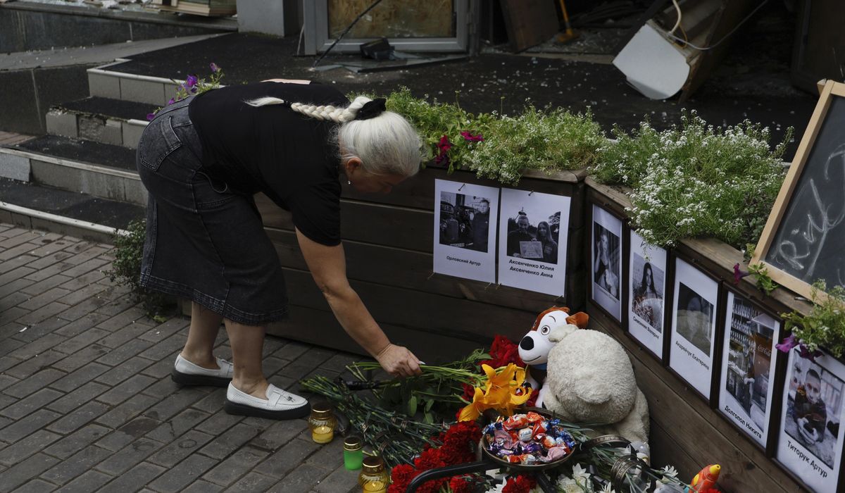 NextImg:Award-winning Ukrainian writer dies of injuries suffered in Russian missile attack on restaurant