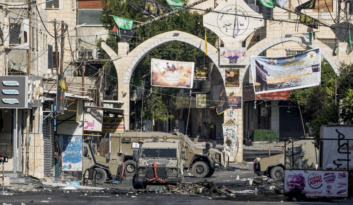 NextImg:Israel presses on with hunt for West Bank militants. The death toll rises to 10 and civilians flee