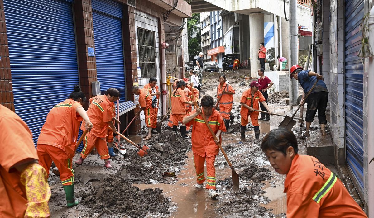 NextImg:15 killed by floods in southwestern China as seasonal torrents hit mountain areas