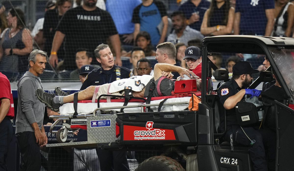Cameraman at Yankee Stadium injured by wild throw from Orioles shortstop Henderson Cameraman at Yankee Stadium injured by wild throw from Orioles shortstop Henderson