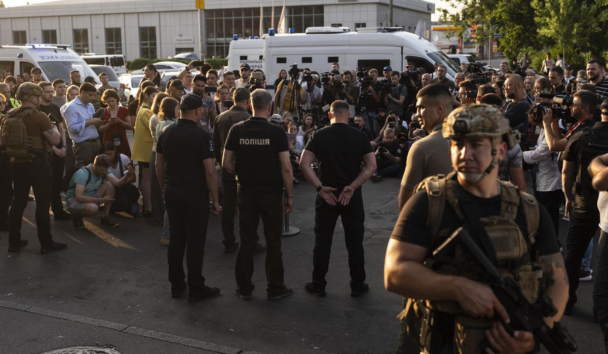 NextImg:Suspect in Ukraine detonates explosives at a courthouse, killing himself and wounding 2 officers