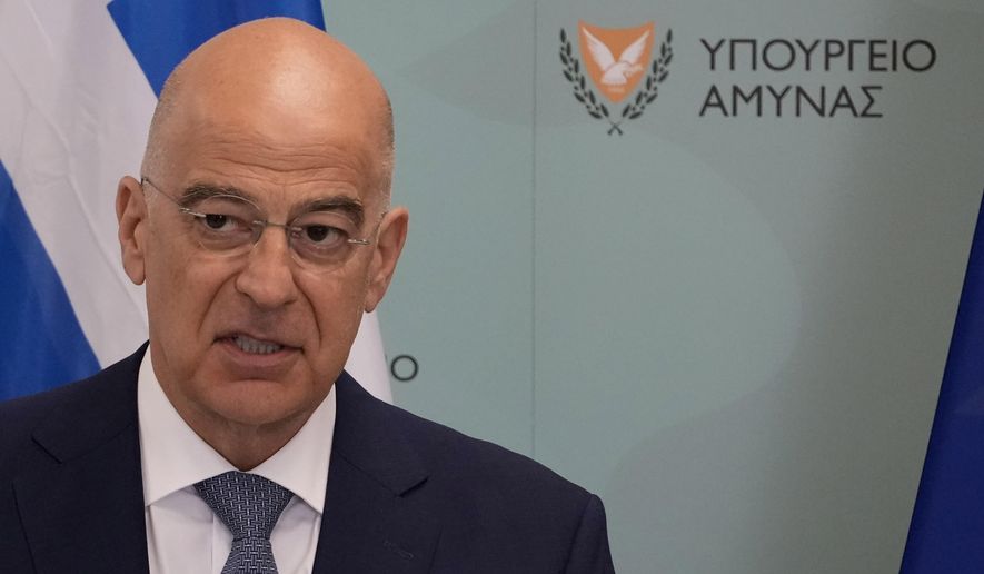 Greece's Defense Minister Nikos Dendias, talks to the media during a press conference after a meeting with his Cypriot counterpart Michalis Georgallas at the Cypriot Defense Ministry in the capital Nicosia, Cyprus, on Thursday, July 6, 2023. (AP Photo/Petros Karadjias) ** FILE **