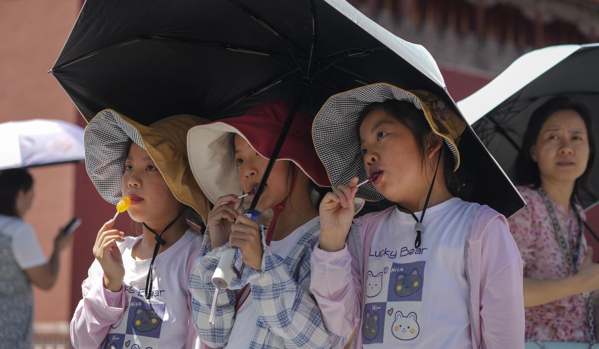 NextImg:Chinese cities open air raid shelters for heat relief as extreme temperatures lead to deaths