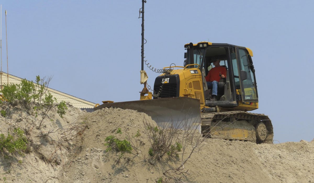 NextImg:What will it take to stop Jersey Shore town from bulldozing its beach? $12M in fines hasn’t done it