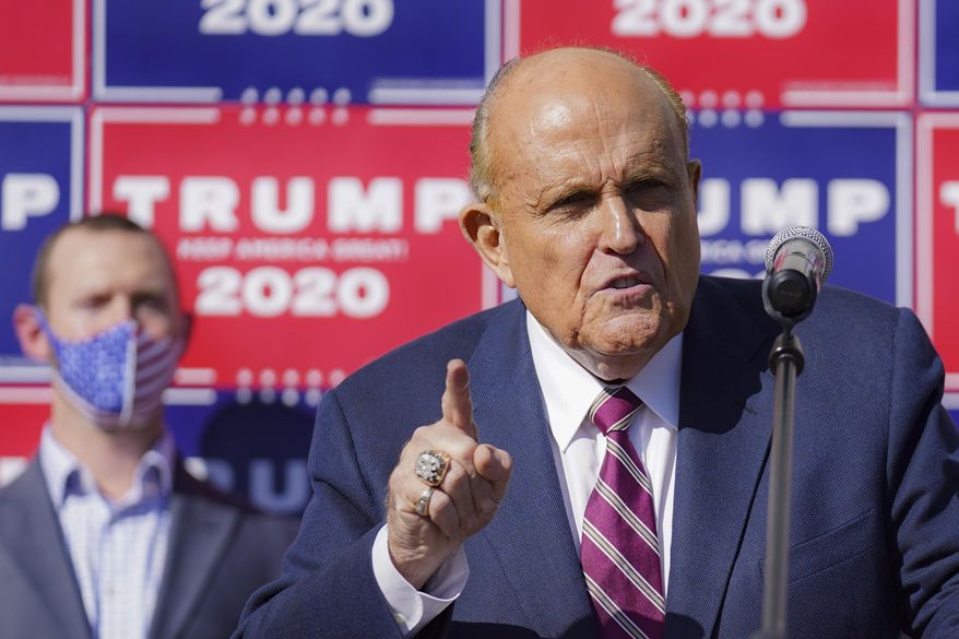 Former New York Mayor Rudy Giuliani, a lawyer for then-President Donald Trump, speaks during a news conference at Four Seasons Total Landscaping on legal challenges to vote counting in Pennsylvania, Nov. 7, 2020, in Philadelphia. (AP Photo/John Minchillo, File)