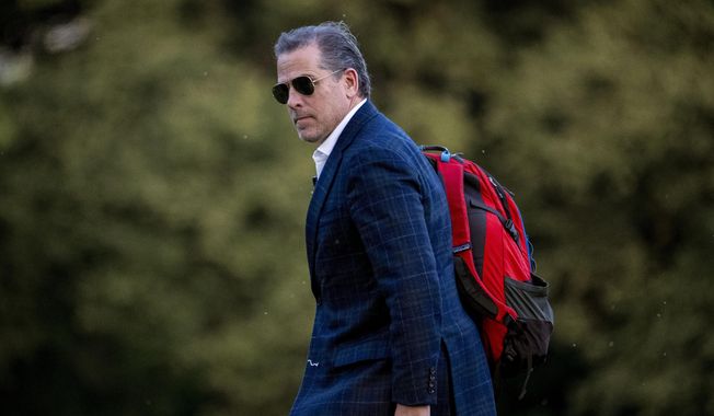 Hunter Biden, the son of President Joe Biden, walks from Marine One upon arrival at Fort McNair, June 25, 2023, in Washington. The Republican chairmen of three key House committees are joining forces to probe the Justice Department&#x27;s handling of charges against Hunter Biden after making sweeping claims about misconduct at the agency. (AP Photo/Andrew Harnik, File)