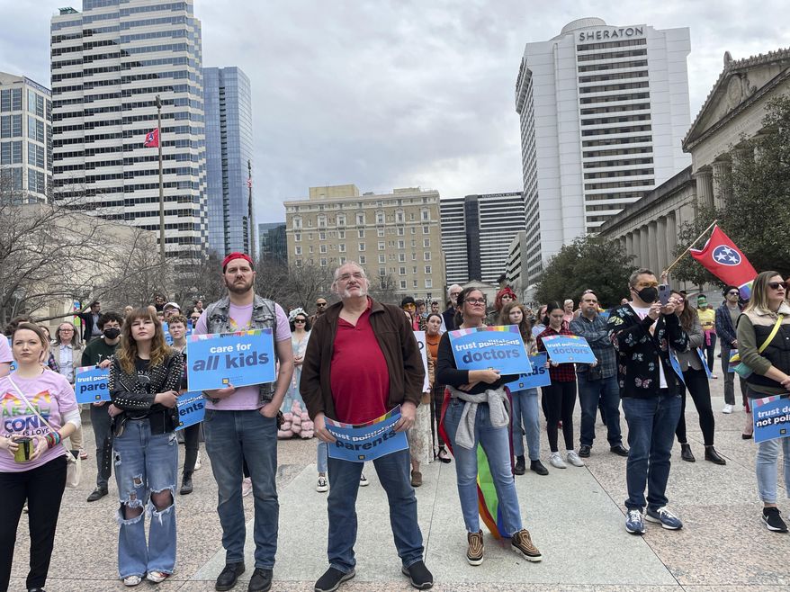 Advocates gather for a rally at the state Capitol complex in Nashville, Tenn., to oppose a series of bills that target the LGBTQ community, Tuesday, Feb. 14, 2023. A federal appeals court has temporarily reversed a lower court's ruling, Saturday, July 8, that had prohibited Tennessee from enacting a ban on gender-affirming care for transgender youth. T (AP Photo/Jonathan Mattise, File)
