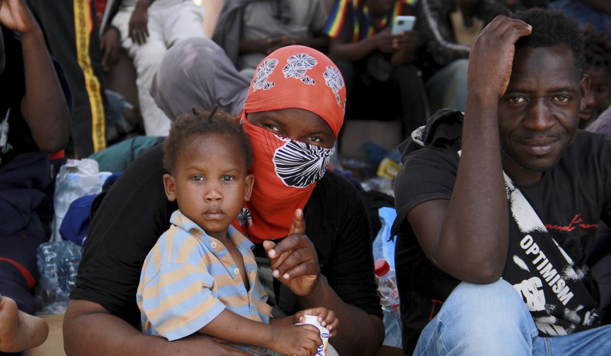 NextImg:Under pressure, Tunisia takes back hundreds of migrants trapped in a border zone with Libya