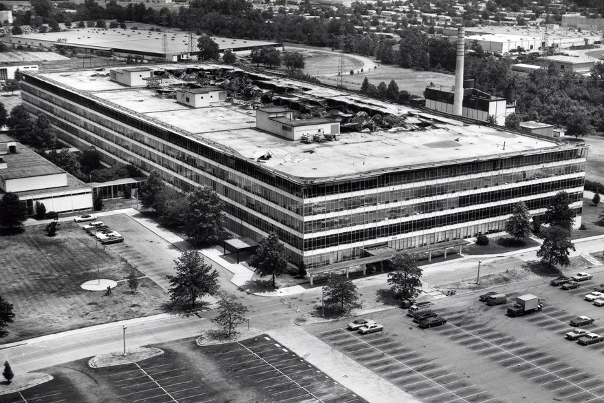This photo provided by the National archives shows the damaged sixth floor and roof of the Military Personnel Records Center in Overland, Mo., near St. Louis, after a massive fire that started on July 12, 1973. (National Archives via AP)