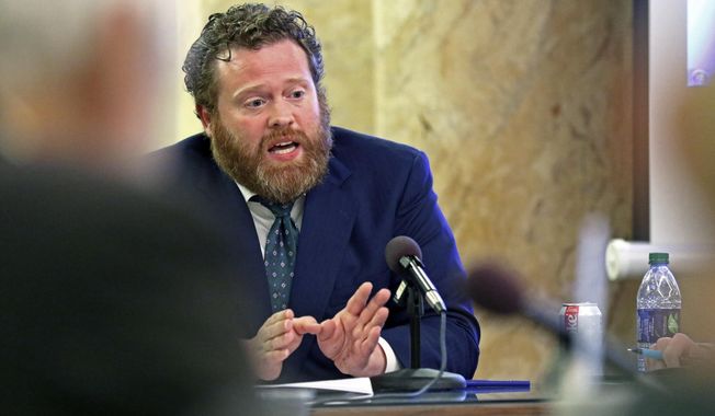 Drew Snyder, executive director of the Mississippi Division of Medicaid, gives an agency update to members of the House Medicaid Committee at the state Capitol, Jan. 23, 2019, in Jackson, Miss. The division announced, Monday, July 10, 2023, that it has started removing thousands of people from the program after the end of a pandemic public health emergency. (AP Photo/Rogelio V. Solis, File)