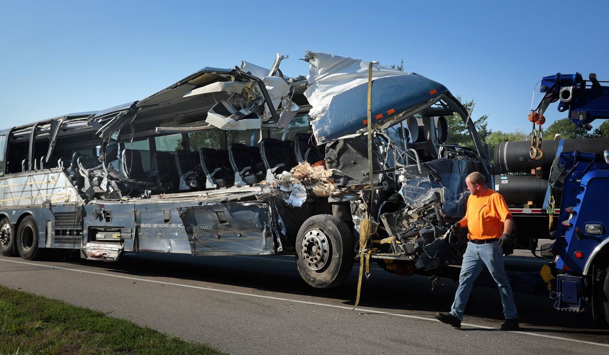 NextImg:Greyhound bus crashes into tractor-trailers in Illinois, killing 3 and injuring 14, police say