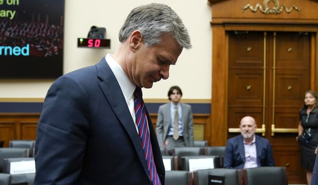 FBI Director Christopher Wray departs after testifying before a House Committee on the Judiciary oversight hearing, Wednesday, July 12, 2023, on Capitol Hill in Washington. (AP Photo/Patrick Semansky) ** FILE **
