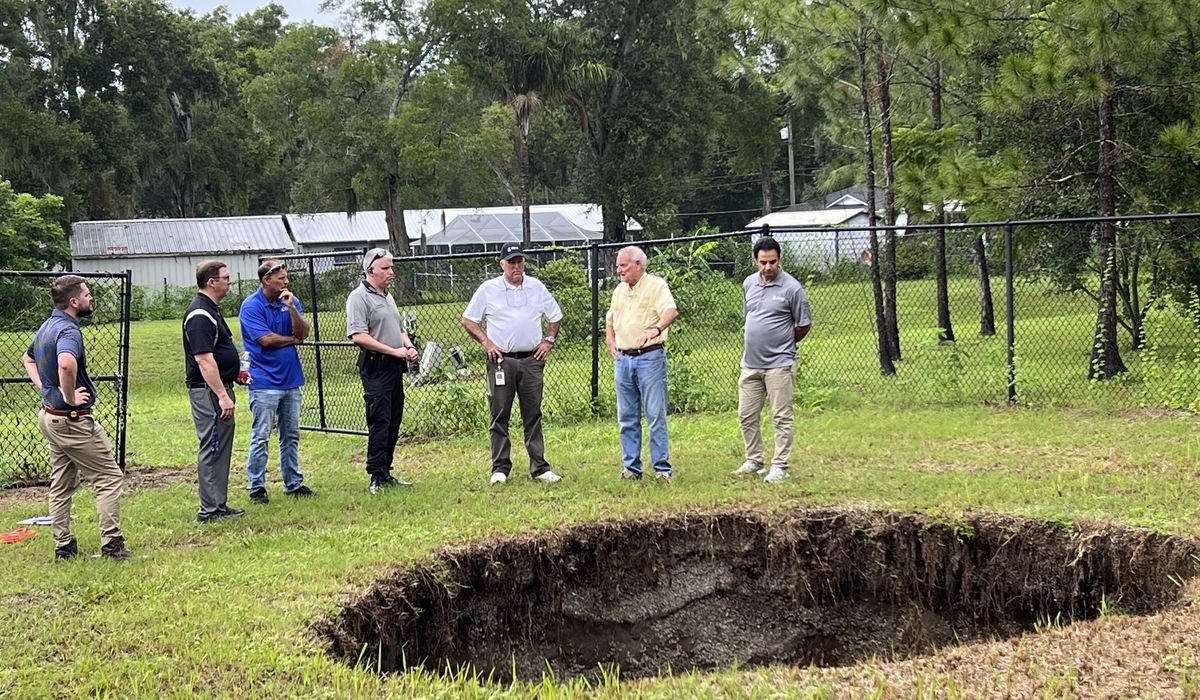 NextImg:Tampa-area sinkhole that killed man in 2013 opens for third time
