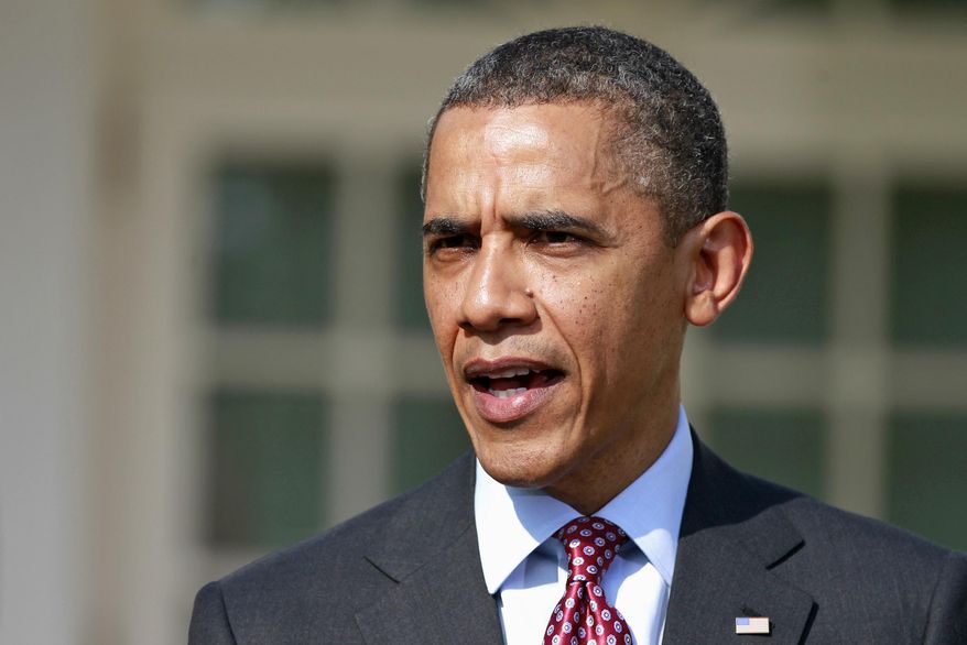 President Barack Obama answers a reporter's question about the death of Trayvon Martin, March 23, 2012, in the Rose Garden of the White House in Washington. Obama, the nation's first Black commander-in-chief, underscored public concerns over fairness in the case when he said, “If I had a son, he'd look like Trayvon.” (AP Photo/ Haraz N. Ghanbari, File)