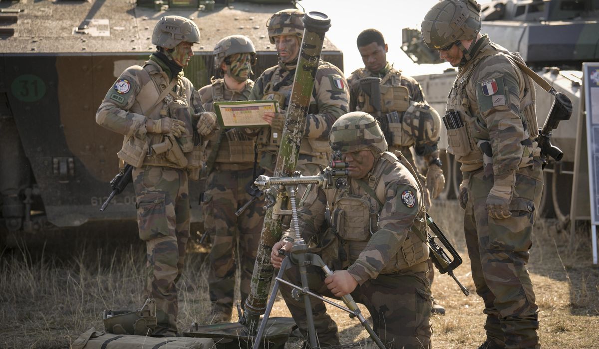 NextImg:France’s parliament approves big boost in military spending, spurred by Ukraine war