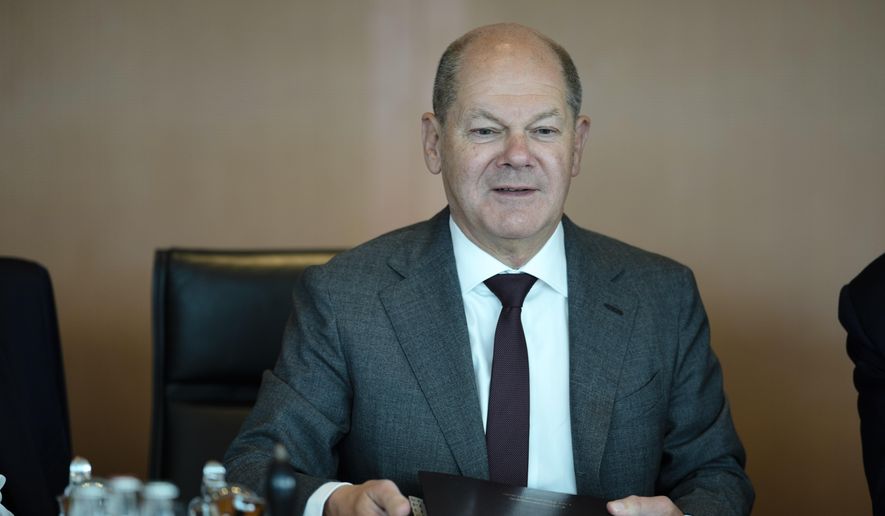 German Chancellor Olaf Scholz attends the Cabinet meeting of the German government at the chancellery in Berlin, Germany, Thursday, July 13, 2023. (AP Photo/Markus Schreiber)