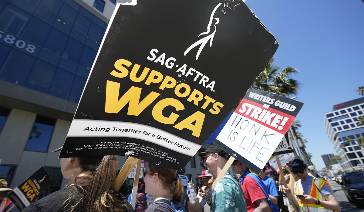 NextImg:Hollywood actors join screenwriters in historic industry-stopping strike as contract talks collapse