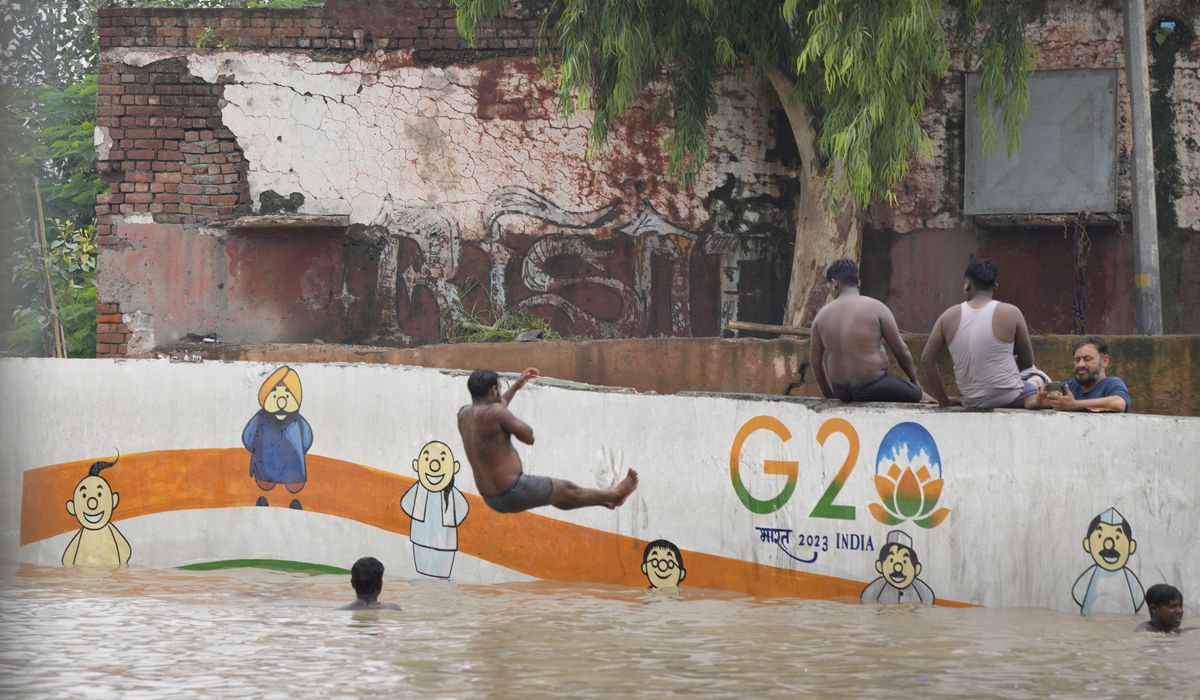 NextImg:Record monsoon rains have killed more than 100 people in northern India over two weeks