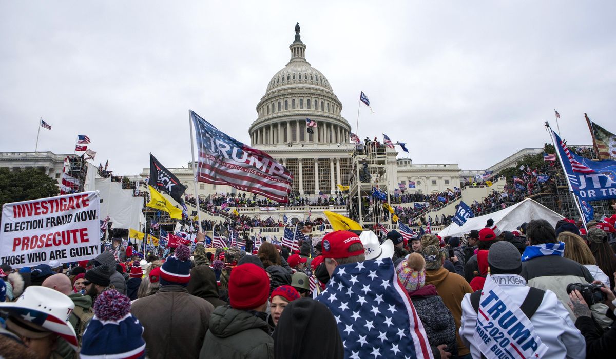 NextImg:Man who took photo from Pelosi’s office is sentenced to over 4 years for Capitol riot role