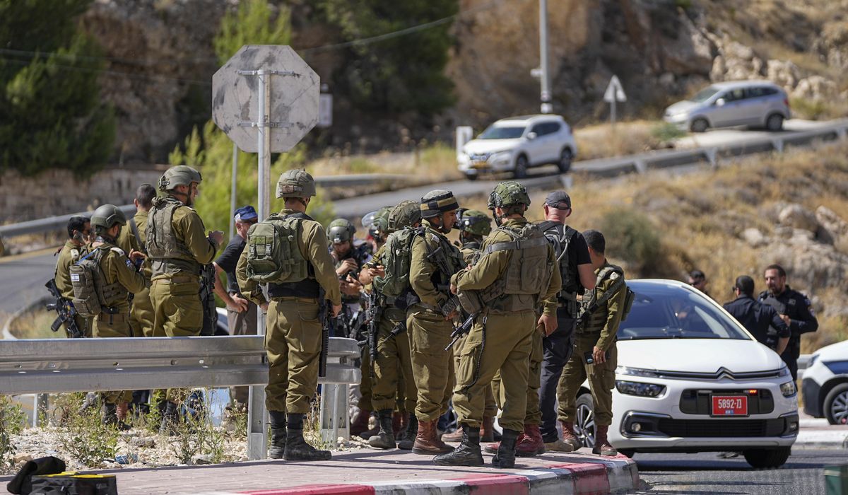 NextImg:Palestinian gunman opens fire on a car in the occupied West Bank, wounding 3, including 2 girls