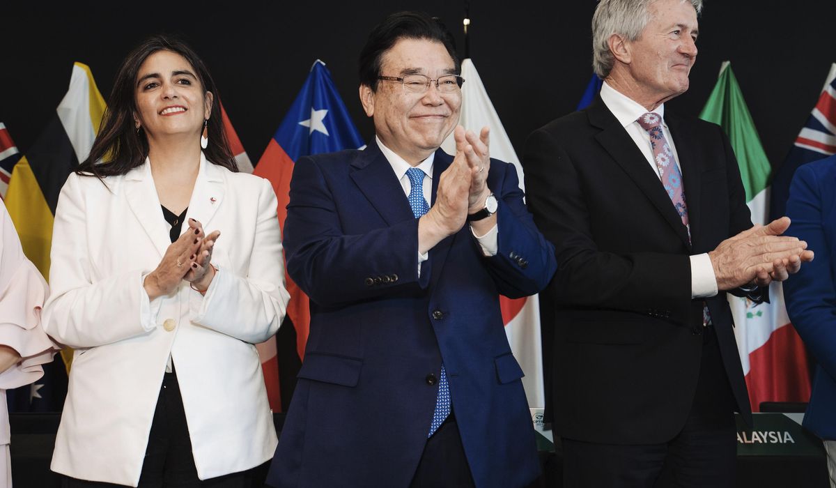 NextImg:Britain officially joins an Asia-Pacific trade group that includes Japan and 10 other nations