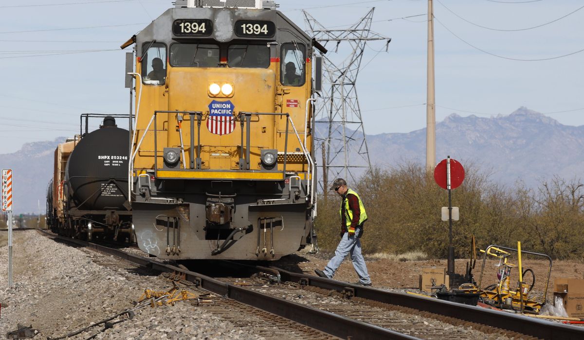 NextImg:Union Pacific railroad to renew push for 1-person crews by testing conductors in trucks