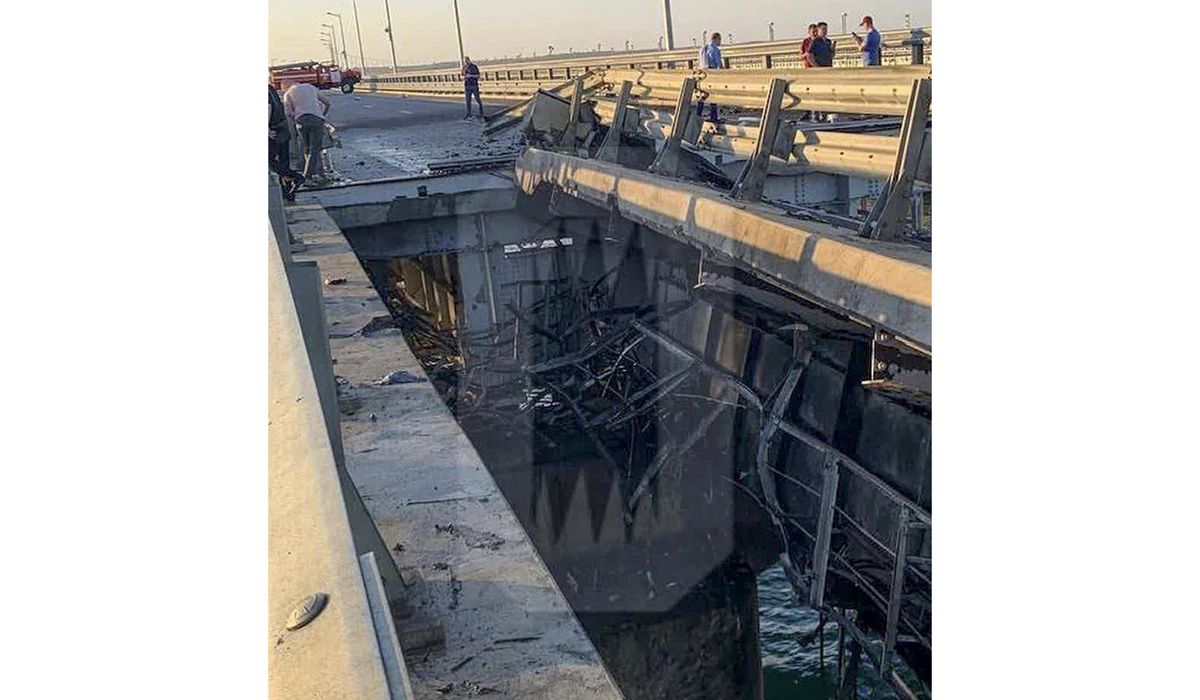 NextImg:Russia blames Ukraine for attack on key Crimea military supply bridge that kills 2