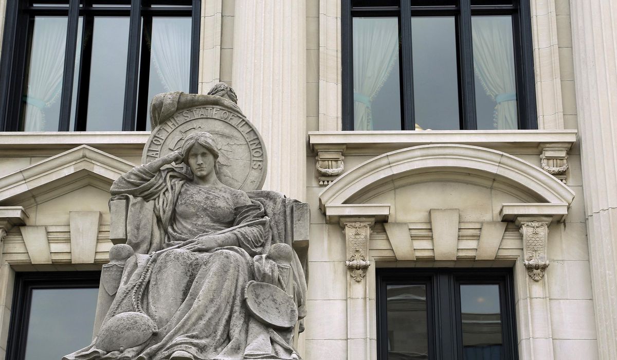 NextImg:Illinois is first state to eliminate cash bail, a penalty affecting low-income communities most