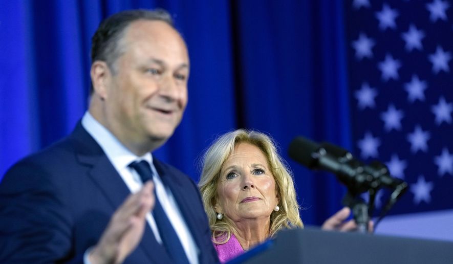 First lady Jill Biden listens as Doug Emhoff, husband of Vice President Kamala Harris, speaks during an event about reproductive rights in Washington, Friday, June 23, 2023. (AP Photo/Susan Walsh)