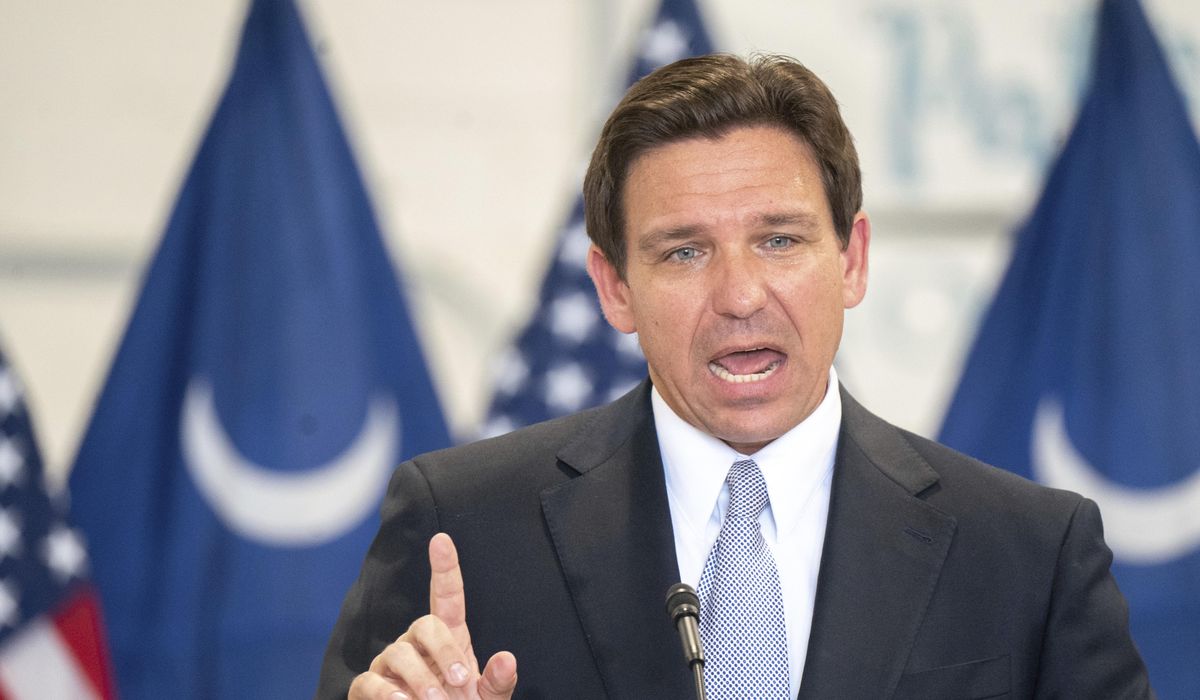 NextImg:DeSantis cuts a third of his presidential campaign staff as he mounts urgent reset