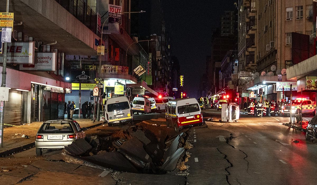 NextImg:Suspected gas explosion in Johannesburg rips open roads and flips cars during rush hour, injuring 9