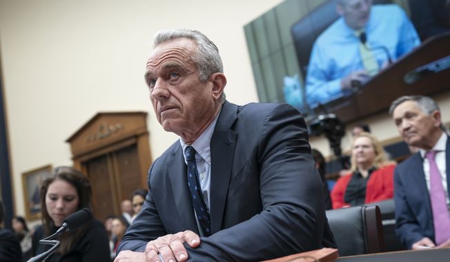 Democratic presidential candidate Robert F. Kennedy Jr., arrives to testify before the House Select Subcommittee on the Weaponization of the Federal Government, Thursday, July 20, 2023, on Capitol Hill in Washington. (AP Photo/J. Scott Applewhite)