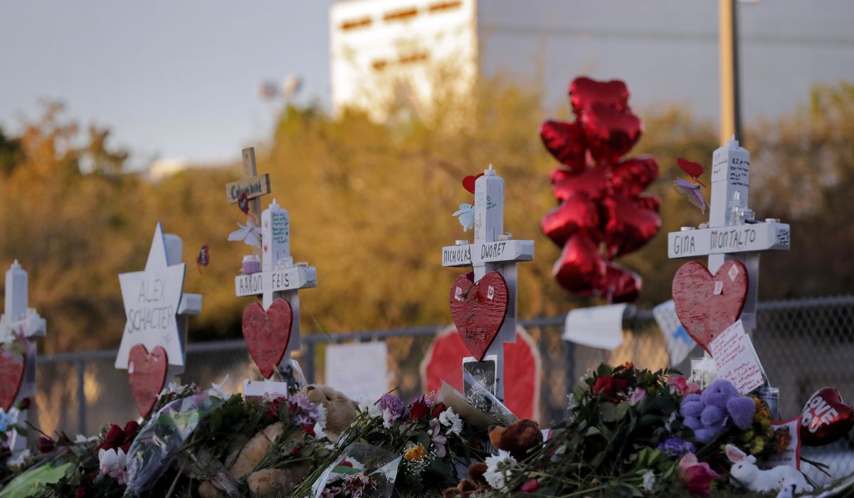 NextImg:Congressional delegation to tour blood-stained halls where Parkland school massacre happened