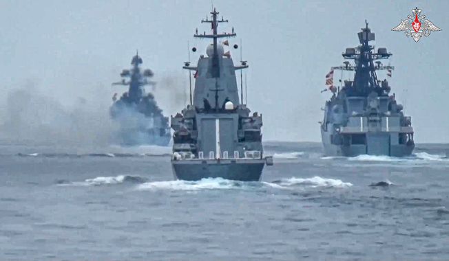 In this photo released by Russian Defense Ministry Press Service on Friday, July 21,2023, warships of the Russian Black Sea Fleet sail while taking part in naval drills in the Black Sea. The Russian Defense Ministry said the navy conducted drills that simulated action to seal a section of the Black Sea. The maneuvers come after Moscow declared large areas of the Black Sea dangerous for navigation following its withdrawal from a deal allowing exports of the Ukrainian grain. (Russian Defense Ministry Press Service via AP) **FILE**
