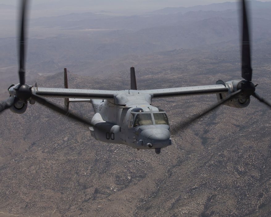In this photo provided by U.S. Marine Corps/3rd MAW, an MV-22B Osprey with Marine Operational Test and Evaluation Squadron (VMX) 1 transports ordnance during an Expeditionary Advanced Base Operation (EABO) exercise to Old Highway 101 near Marine Corps Base Camp Pendleton, Calif., on May 25, 2022. The deadly crash of a Marine V-22 Osprey, like the one shown, in California last year was caused by mechanical failure, according to an investigation that ruled out pilot and maintenance errors. (U.S. Marine Corps via AP, File)